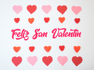 San Valentine&acute;s hearts decorations made with red and pink papers and jelly beans and gummies