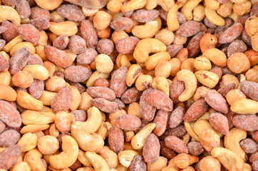 Background of many cashew nuts in sweet shells