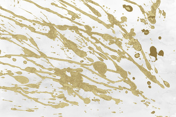Fototapeta na wymiar Luxury gold and white metal paint splatter effect on watercolor paper background. Gold glitter splash texture. Beautiful feminine backdrop.