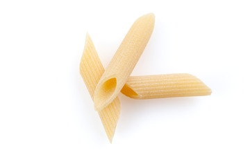 Raw feathers macaroni. Italian pasta close up on the white background