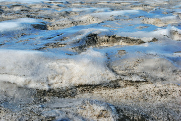 Dirty melting snow, early spring, natural background