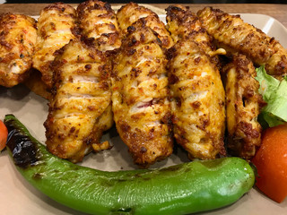 Turkish Style Spicy Chicken Wings Kebab / Kebap served at Restaurant.