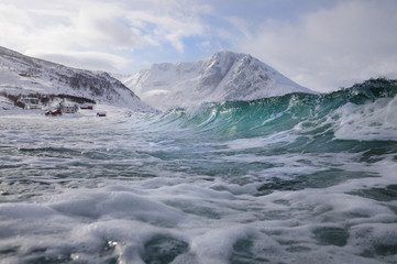 Ice Wave with snowy mountains