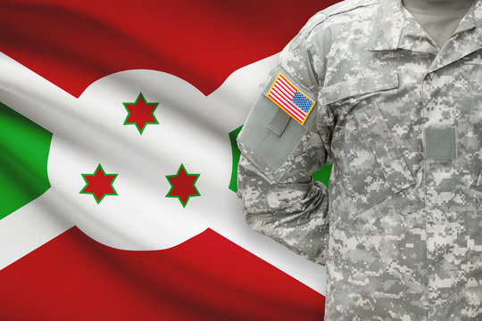 American soldier with flag on background - Burundi