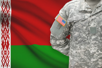 Fototapeta na wymiar American soldier with flag on background - Belarus