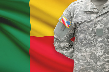 American soldier with flag on background - Benin