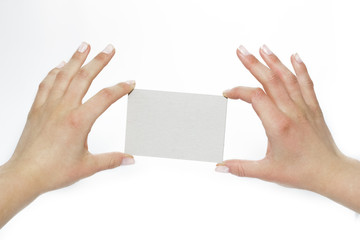 in the hands of advertising card on a white background