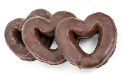 three chocolates gingerbread in the shape of heart isolated white background.