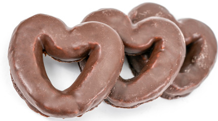 three chocolates gingerbread in the shape of heart isolated white background.
