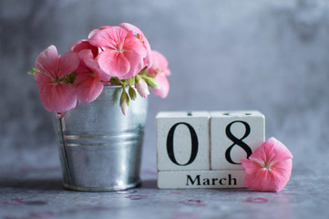 International Women's Day March 8.  Vintage white perpetual calendar with the date of March 8 and a...