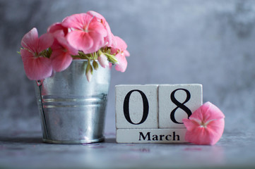 International Women's Day March 8.  Vintage white perpetual calendar with the date of March 8 and a...
