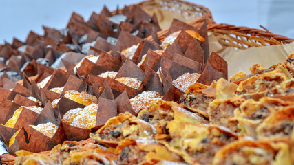 Many fresh delicious muffins or cupcakes.