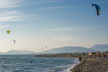 Kite surfers catch the waves on the windy Adriatic, Ulcinj, Montenegro.