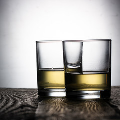 Pure water is poured into a glass beaker.