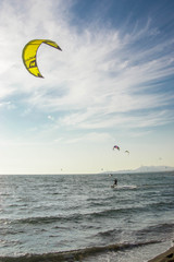 Kite surfers catch the waves on the windy Adriatic, Ulcinj, Montenegro.