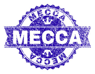 MECCA rosette stamp watermark with distress style. Designed with round rosette, ribbon and small crowns. Blue vector rubber watermark of MECCA caption with dirty style.