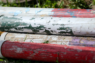 Multi colored image of show jumping poles at the show jumping arena. Wooden barriers for jumping...