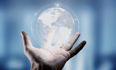Businessman holding in hand with global connection concept.