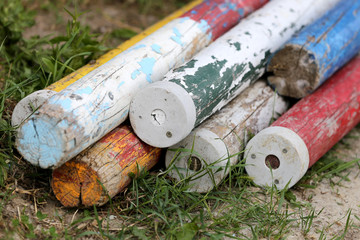 Multi colored image of show jumping poles at the show jumping arena. Wooden barriers for jumping...