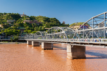 The Zhongshan Bridge in Lanzhou (China) during a sunny afternoon