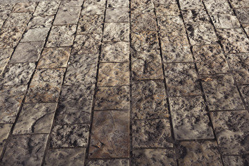 Stone pavement texture. Granite cobblestoned pavement background. - 243951638