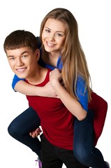 Young couple - piggyback ride