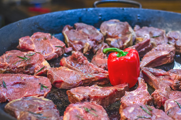 juicy flavored grilled steaks on fire