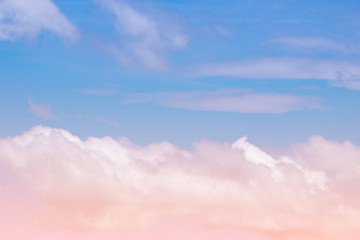 Sweet pastel colored cloud and sky with sun light, soft cloudy with gradient pastel color background.