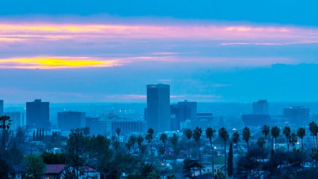 Timelapse of Colorful Sunset Burn over Westside LA -Pan Right-