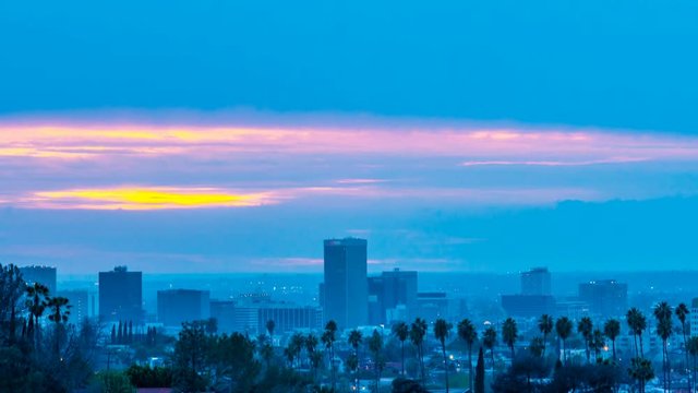 Timelapse of Colorful Sunset Burn over Westside LA -Tilt Up-