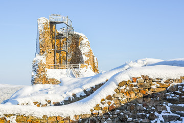 Ruins of medieval castle Lichnice near Tremosnice, Czech Republic. Sunny snowy winter day.