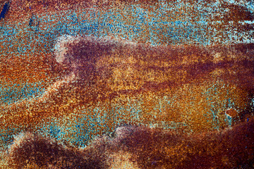 Closeup of rusted old red metal surface.