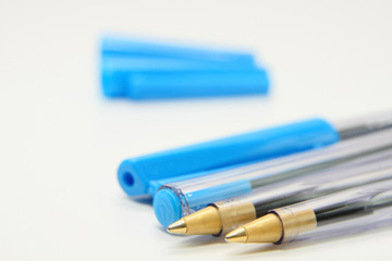 Cutout of ball point pens on white background