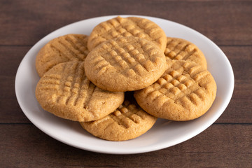 Classic Homemade Peanut Butter Cookies on a White Saucer