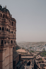 Mehrangarh Fort above the blue city of Jodhpur in Rajasthan, India