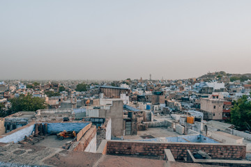Mehrangarh Fort with the blue city of Jodhpur, Rajasthan, India in the front