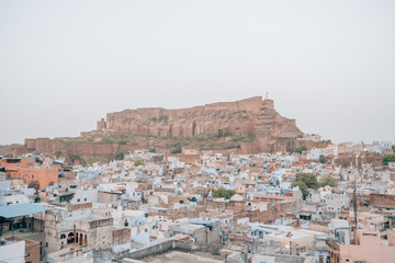 Obraz premium Mehrangarh Fort with the blue city of Jodhpur, Rajasthan, India in the front