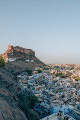 Fototapeta na wymiar Mehrangarh Fort with the blue city of Jodhpur, Rajasthan, India in the front