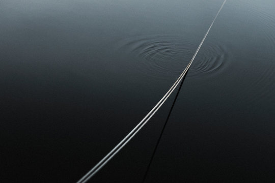 Ropes in a still and clear water