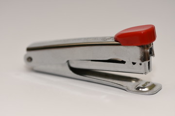 small stainless steel stapler  isolated on a white background