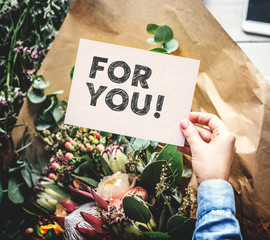 Flowers and a phrase For you on a card