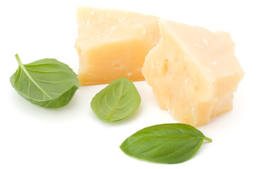 shredded parmesan cheese and basil leaf isolated on white background cutout