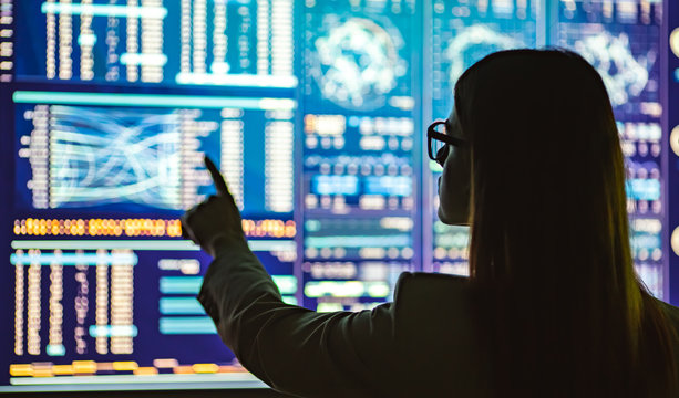 The businesswoman working with the sensor display