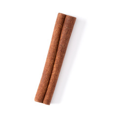 Cinnamon stick isolated on white background closeup. Canella spice. Aromatic condiment background....