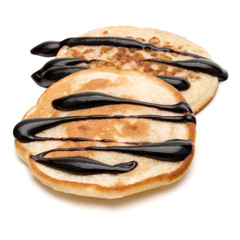 Two pancakes isolated on white background cutout.