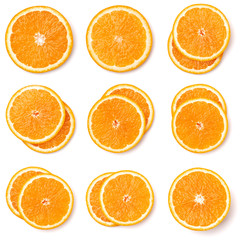 Seamless pattern of orange fruit slices. Orange slices isolated on white background. Food background. Flat lay, top view.