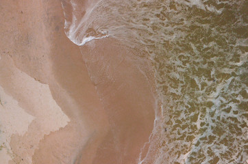 Fototapeta premium Waves on the beach view from drone