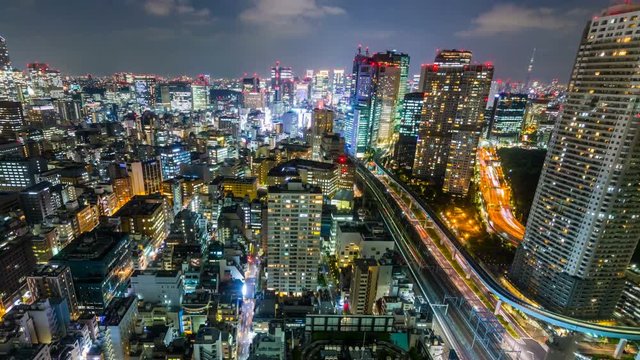 Timelapse Overview of Congested Tokyo Cityscape at Night -Pan Left-