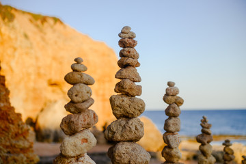Stones balance on beach, sunset shot