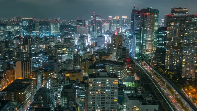 Timelapse Overview of Congested Tokyo Cityscape at Night -Zoom Out-
